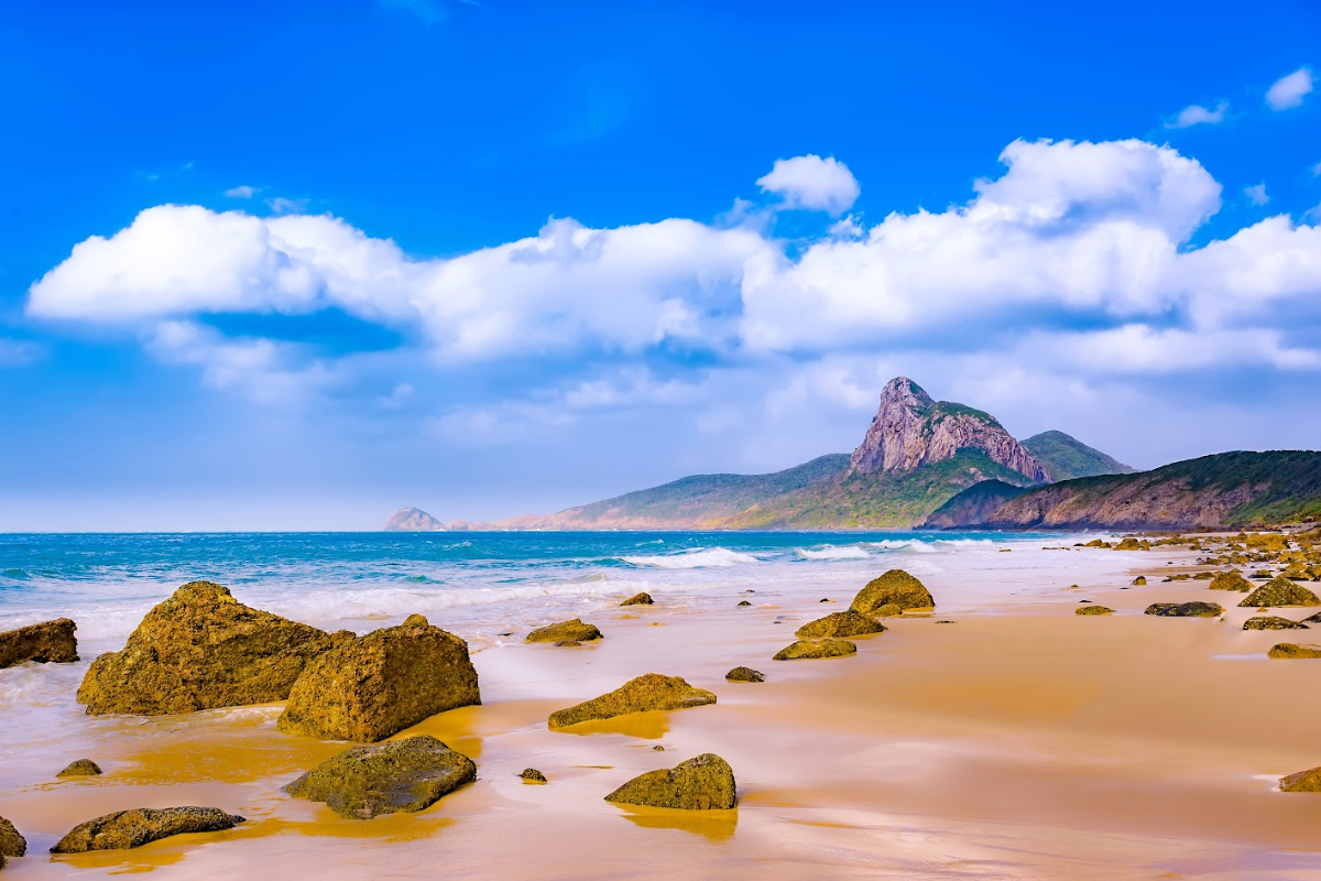 Golden sand beach in Con Dao under a bright sunny sky during dry season